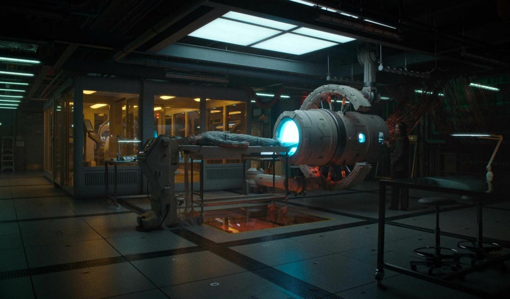 Mickey Barnes (Robert Pattinson) et la machine d'impression © Warner Bros
